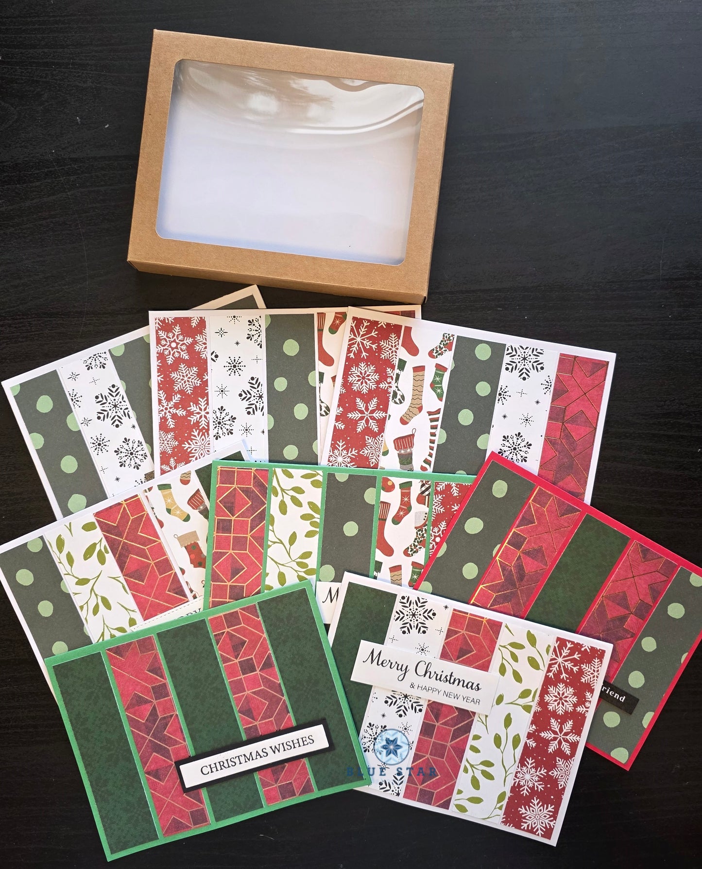 Collection of Christmas-themed greeting cards with a box
