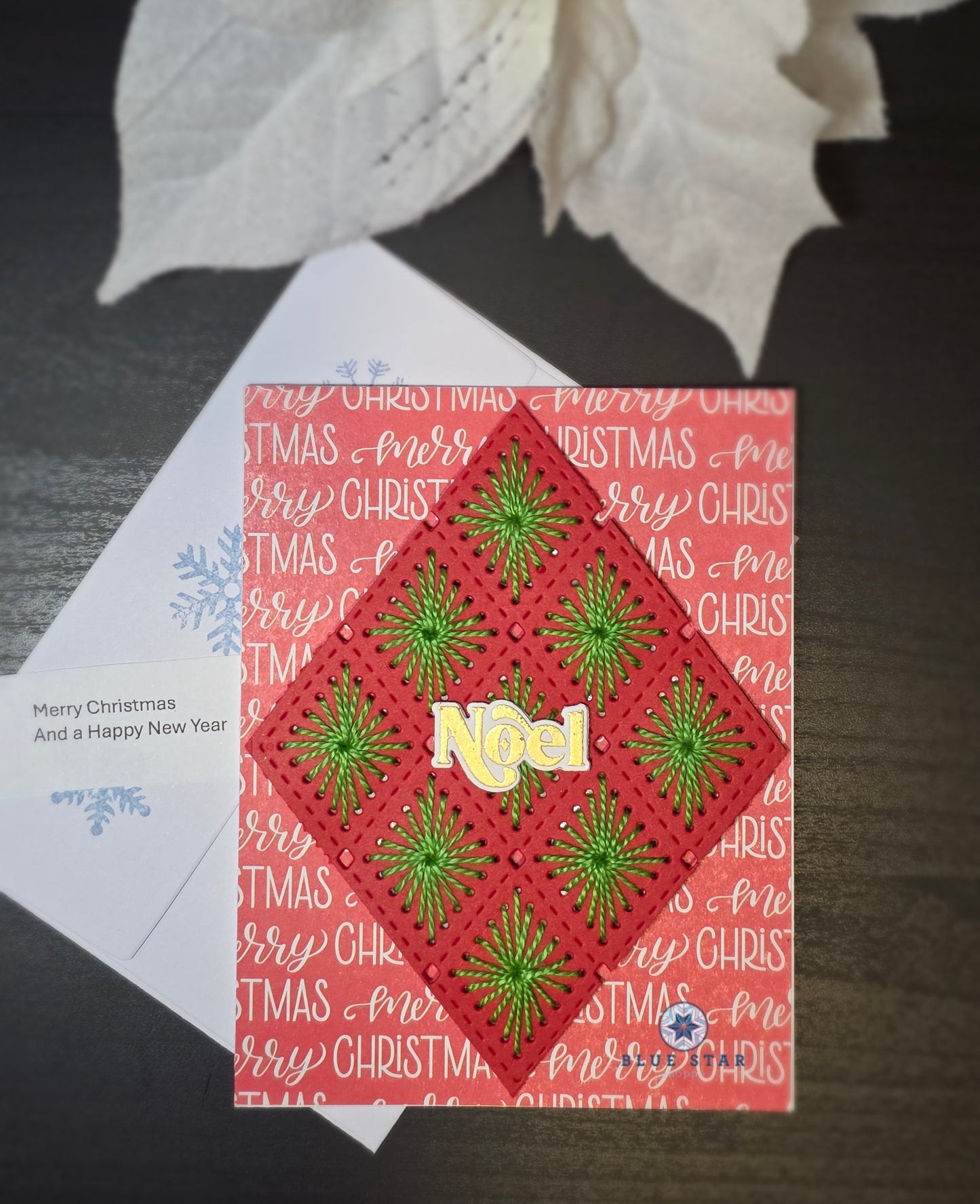 Noel (red diamond) - stitched