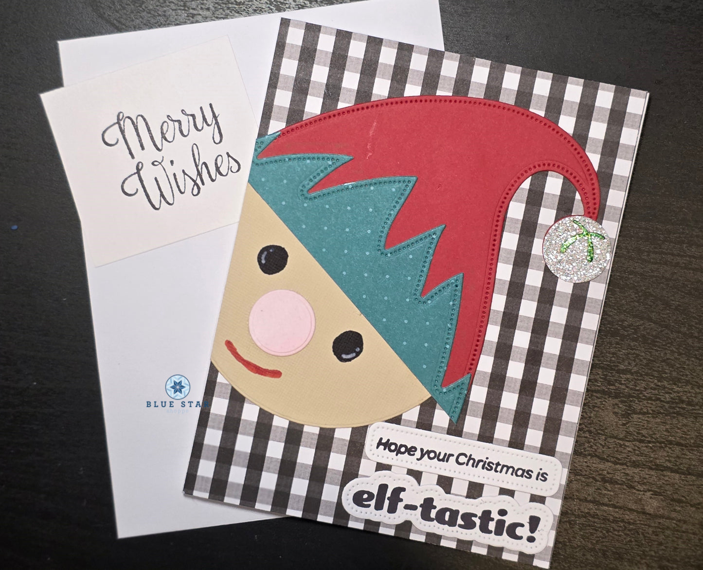 Card with elf design and text 'Hope your Christmas is elf-tastic!' on a checkered background
