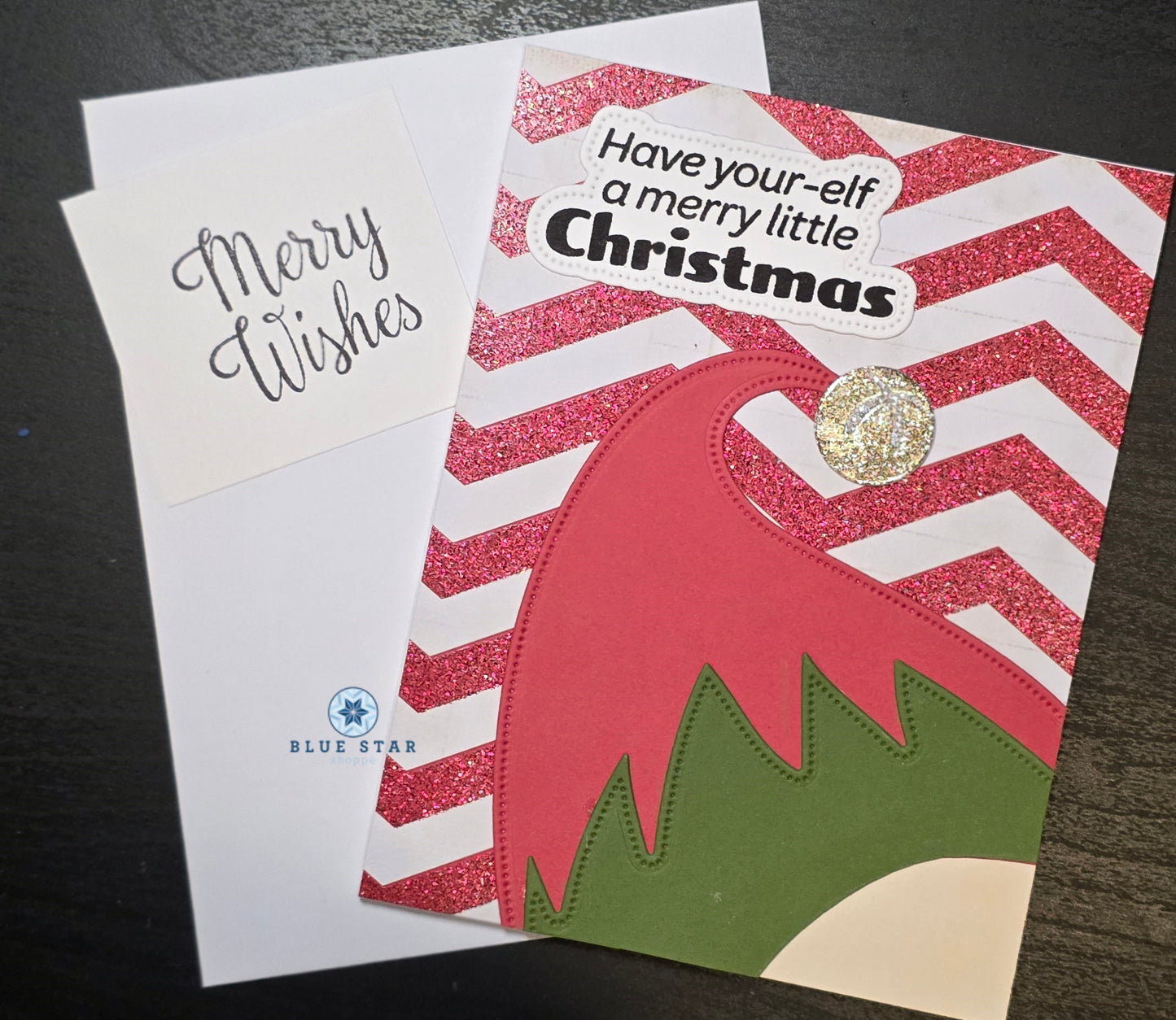 Christmas card with elf design and 'Have your elf a merry little Christmas' text 