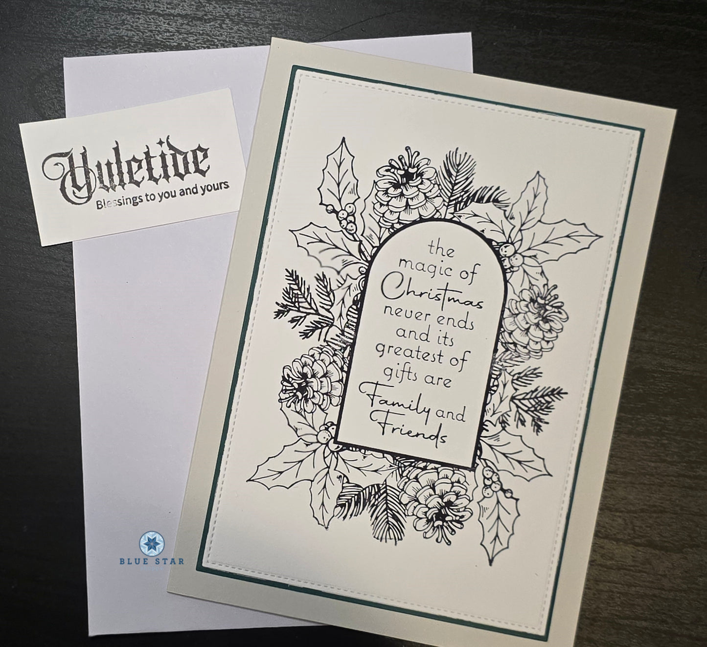 Christmas card with floral design and text 